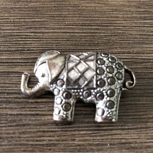 rhinestone and metal elephant brooch